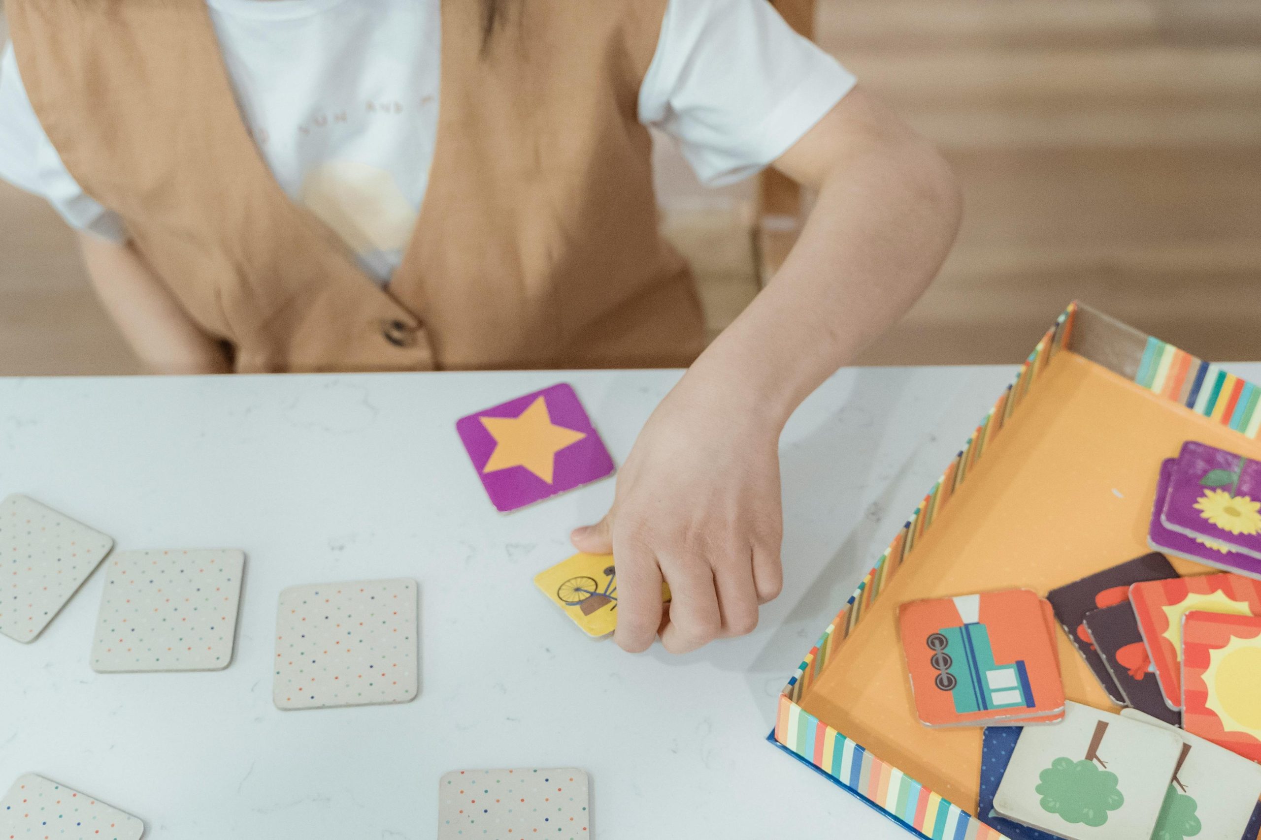 children playing memory card matching game