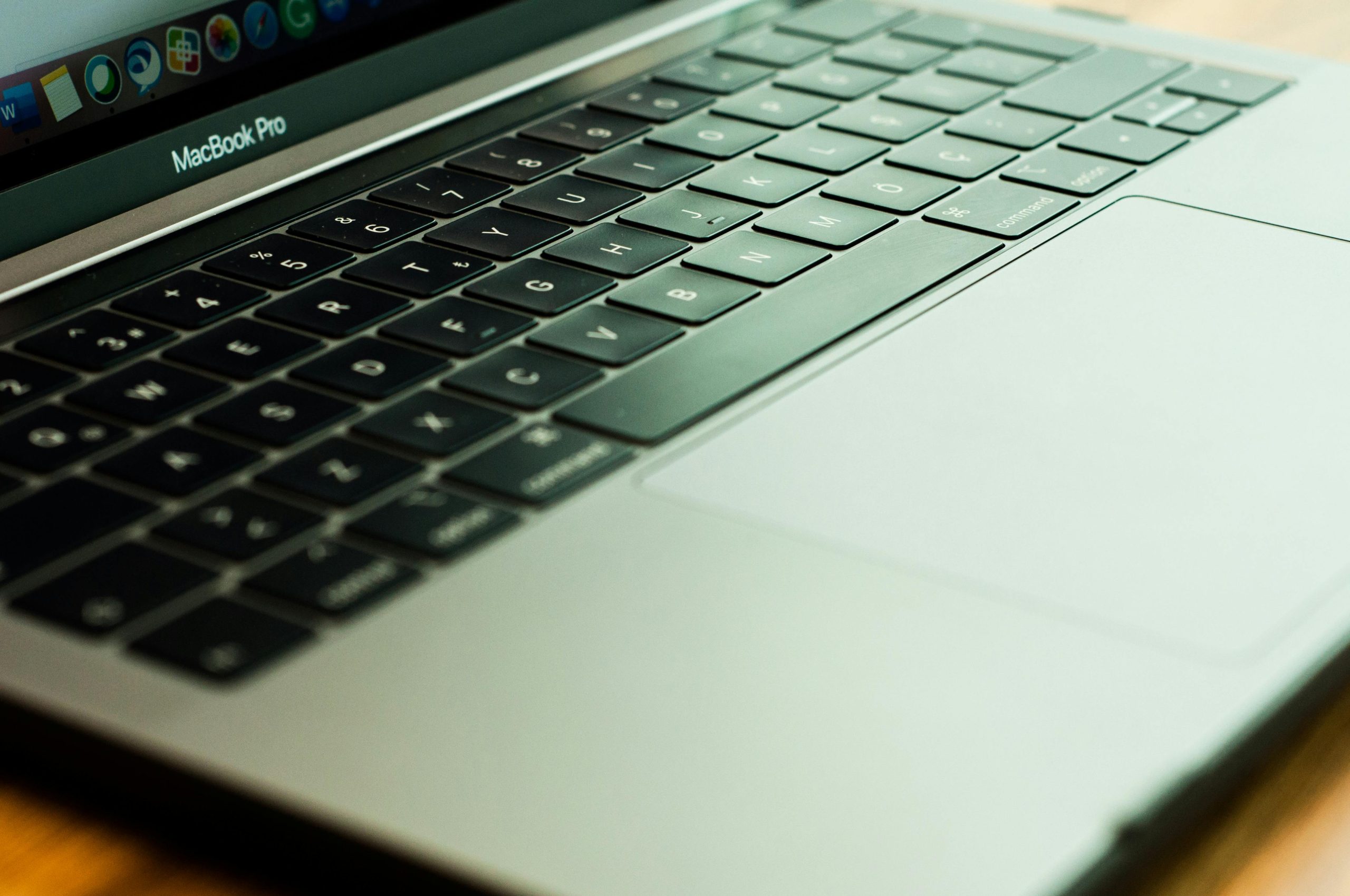 “MacBook Pro M4 2025 with sleek Midnight Titanium design, AI-powered performance, and Liquid Retina XDR display on a modern workspace.”