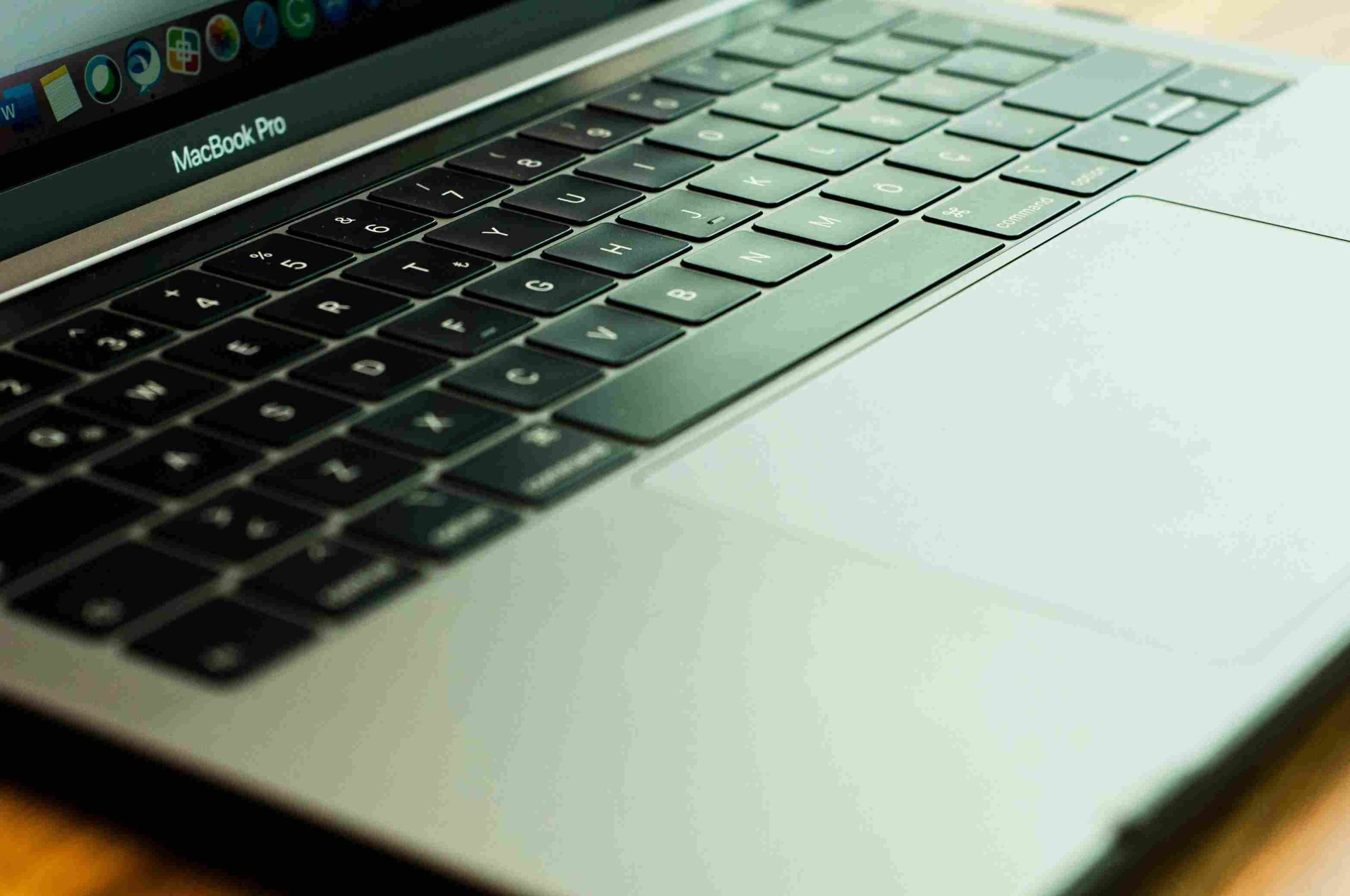 “MacBook Pro M4 2025 with sleek Midnight Titanium design, AI-powered performance, and Liquid Retina XDR display on a modern workspace.”